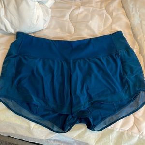 Size 10 lululemon shorts in blue with mesh